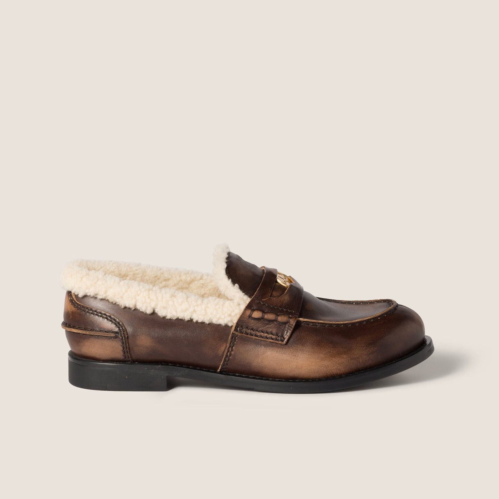 Bleached leather and shearling penny loafers