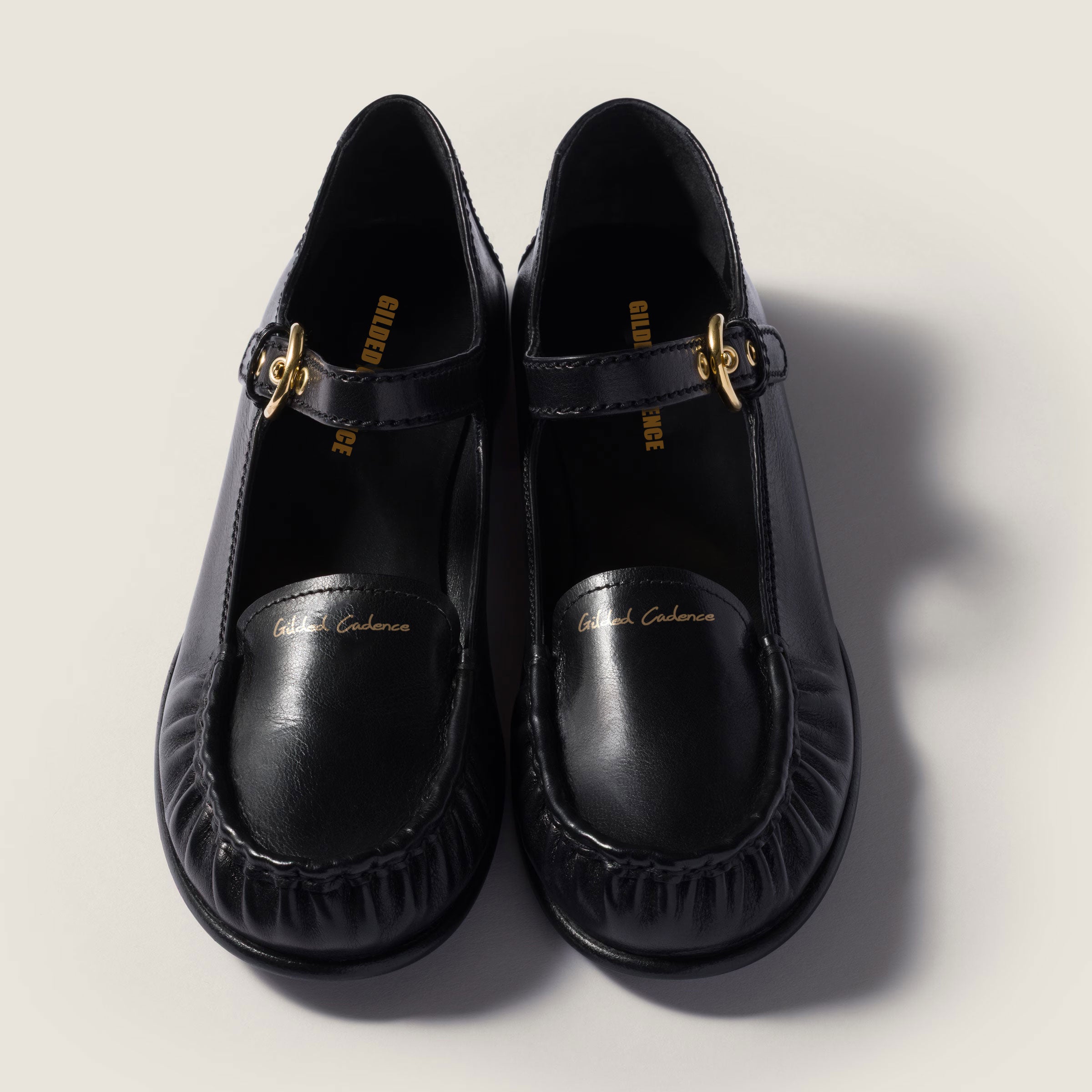 Leather loafers with strap