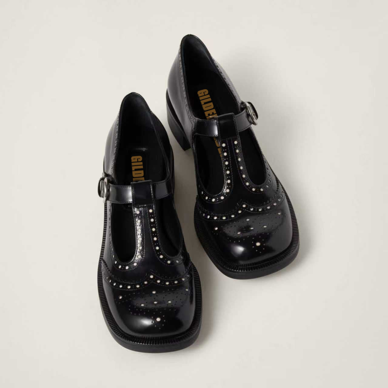 Brushed leather T-strap brogue shoes