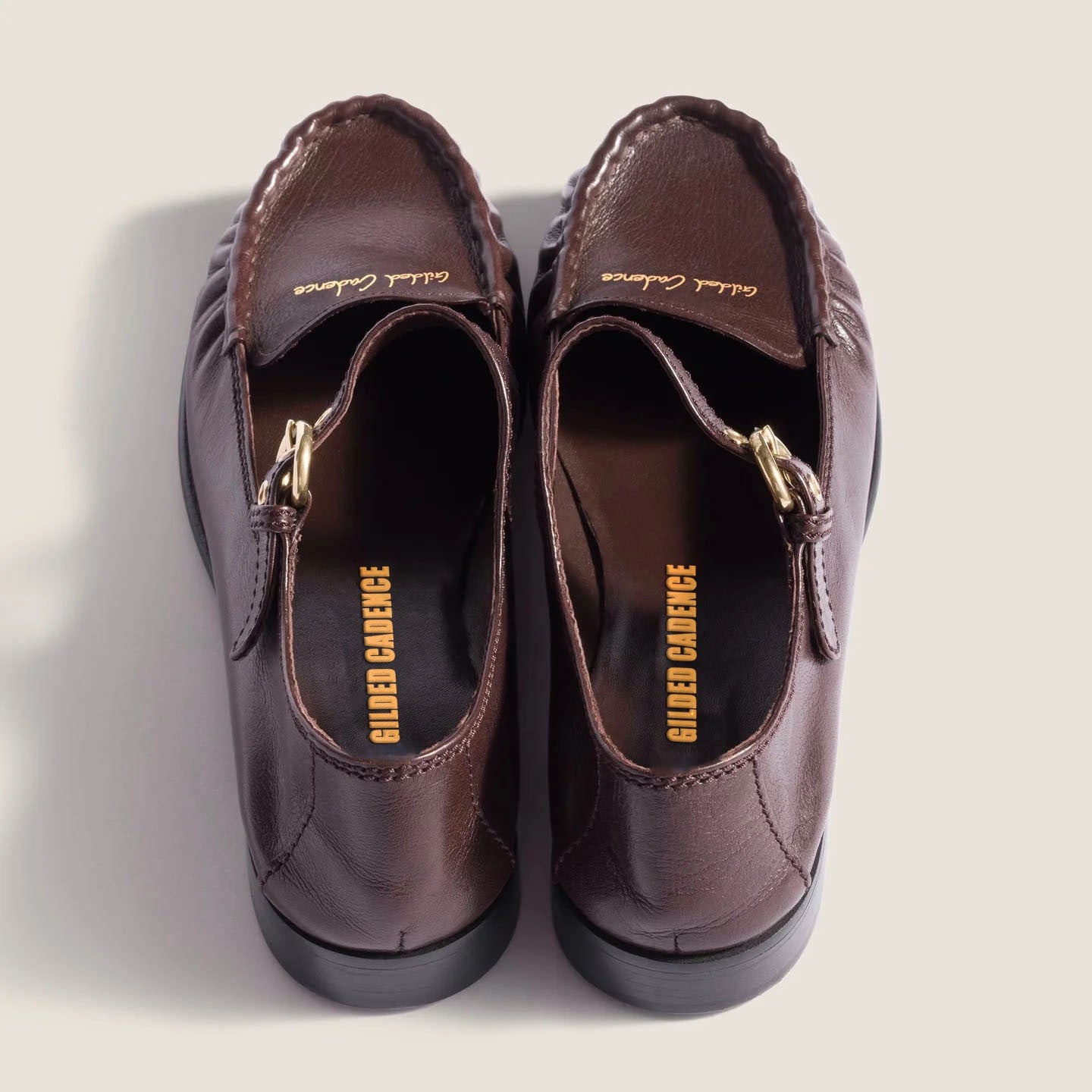 Leather loafers with strap