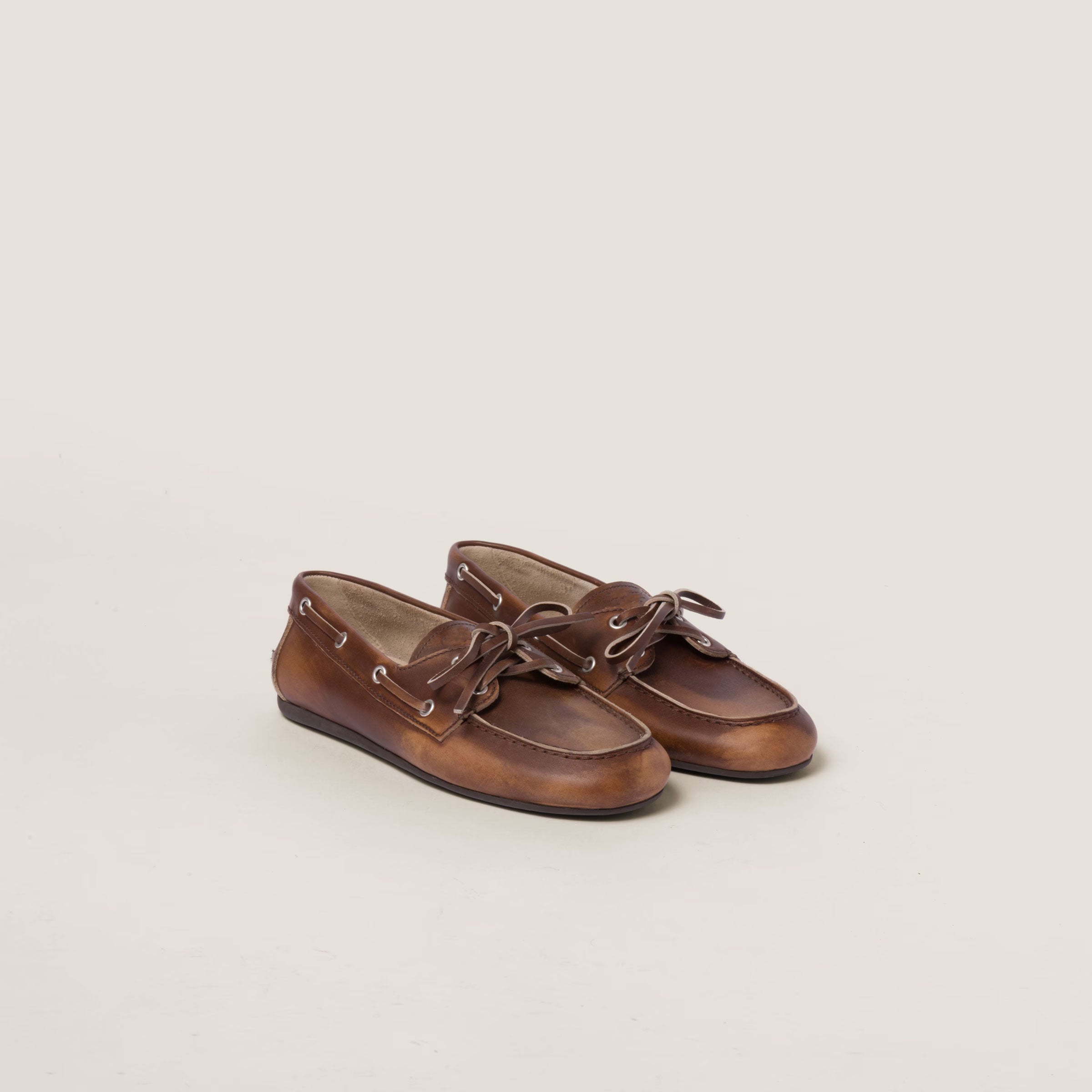Unlined bleached leather boat shoes
