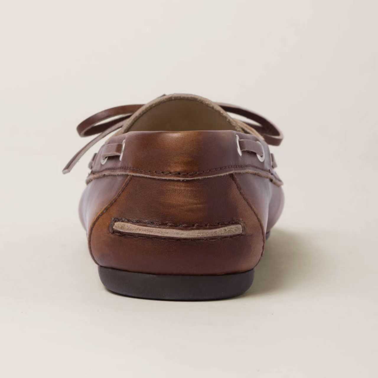 Unlined bleached leather boat shoes