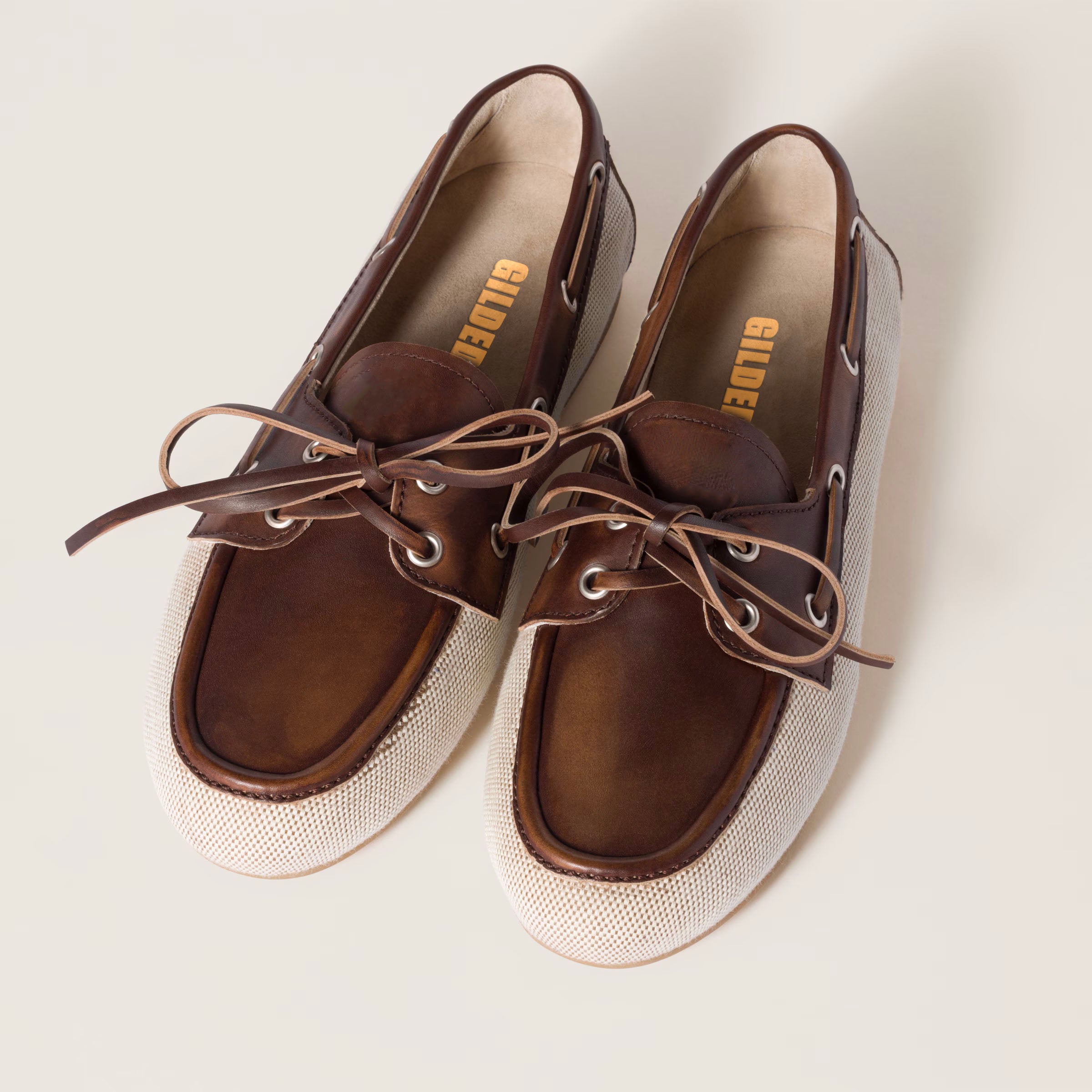 Canvas and bleached leather boat shoes