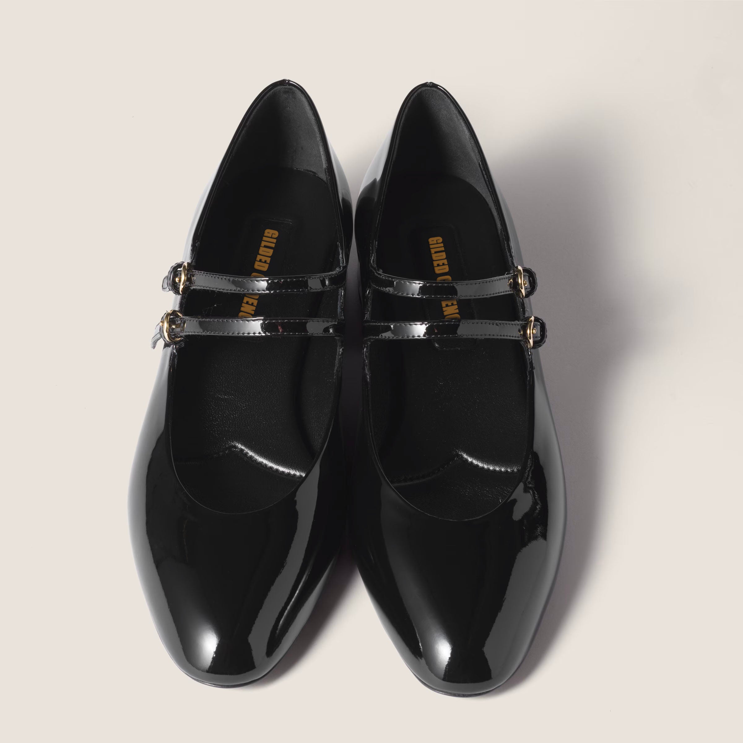 Patent leather slingback pumps with buckles