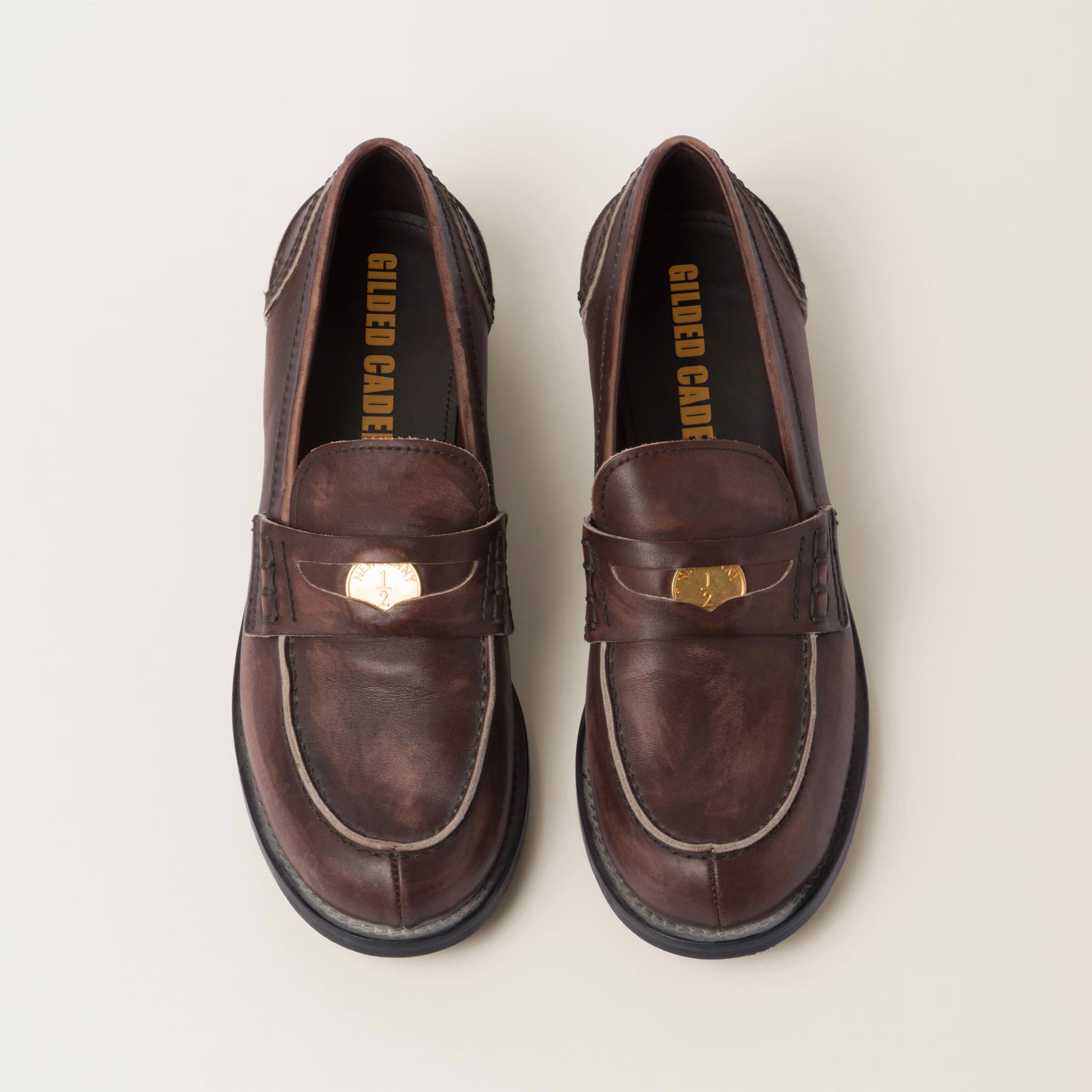 Vintage-effect leather penny loafers