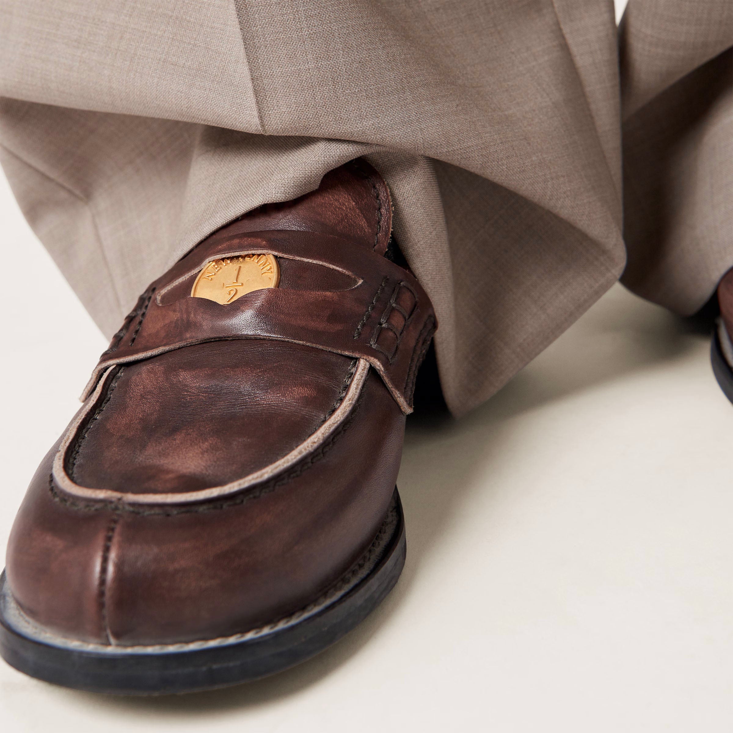 Vintage-effect leather penny loafers