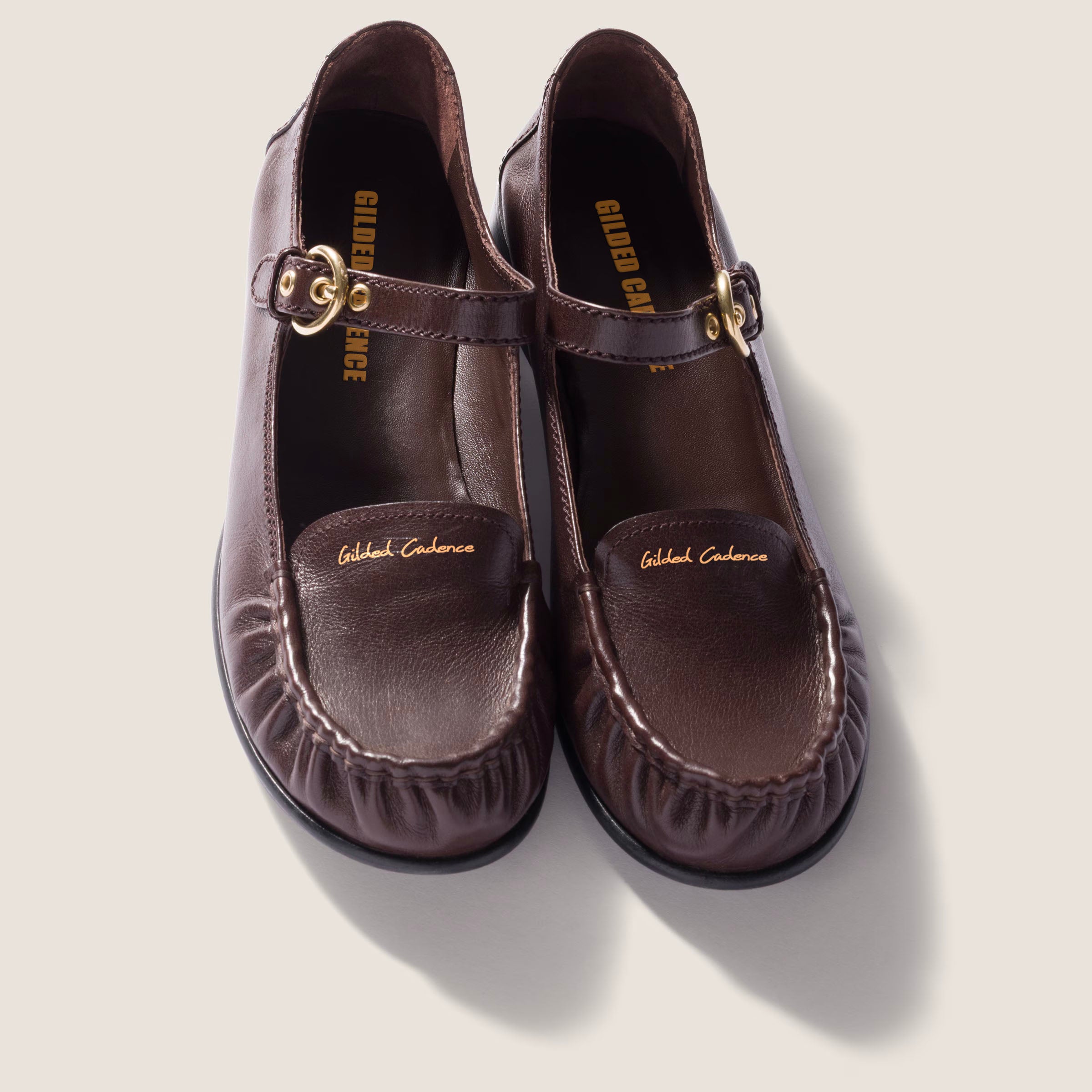 Leather loafers with strap