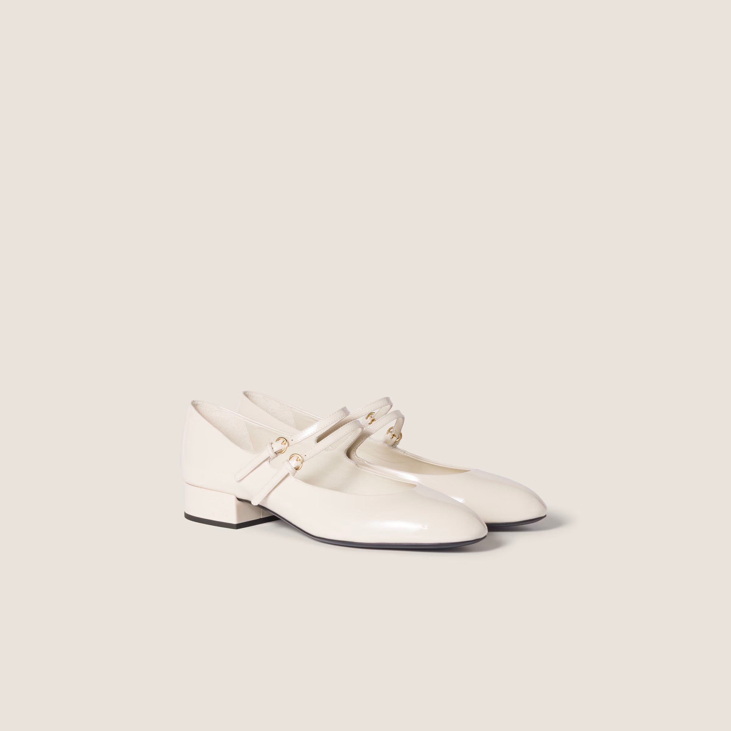 Patent leather slingback pumps with buckles