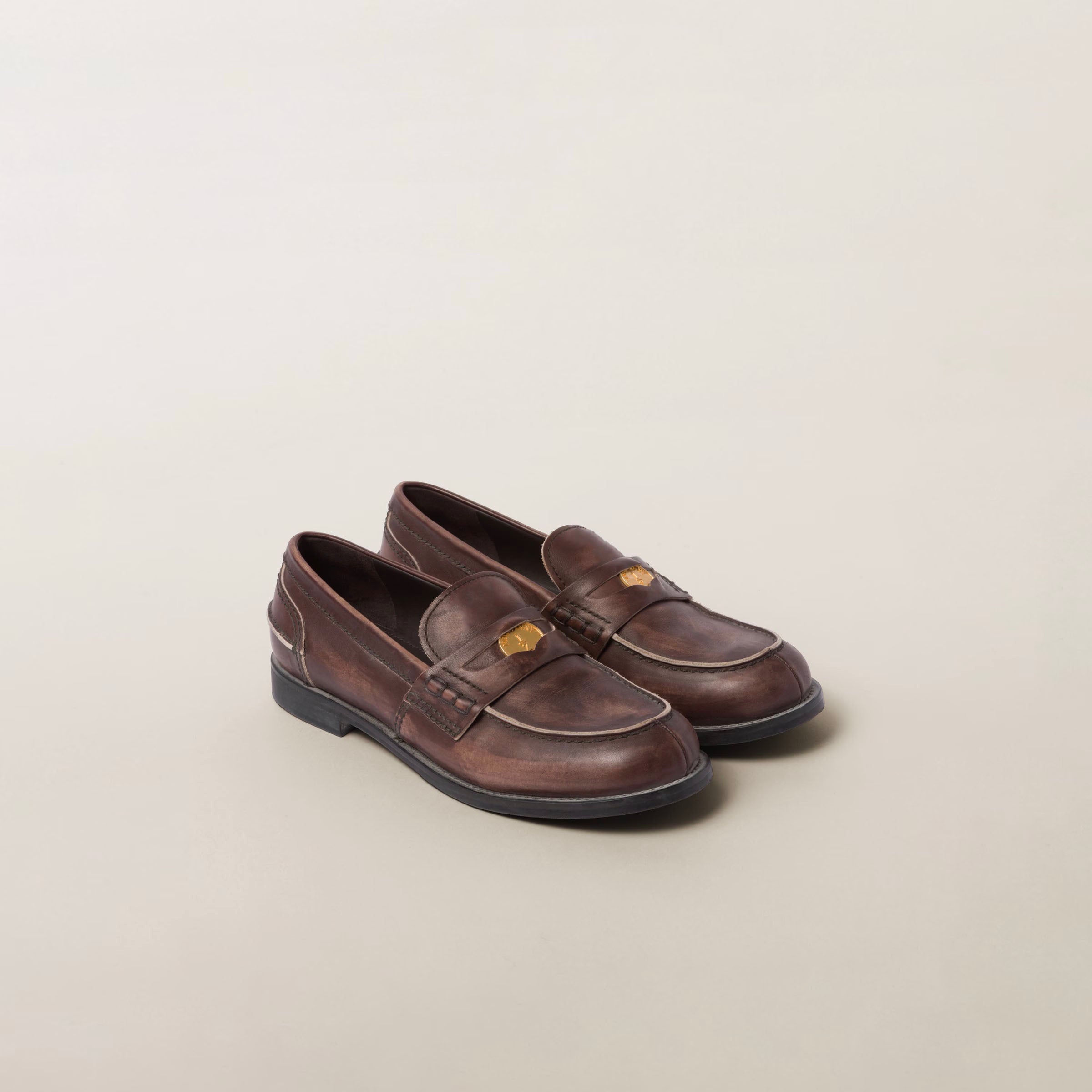 Vintage-effect leather penny loafers