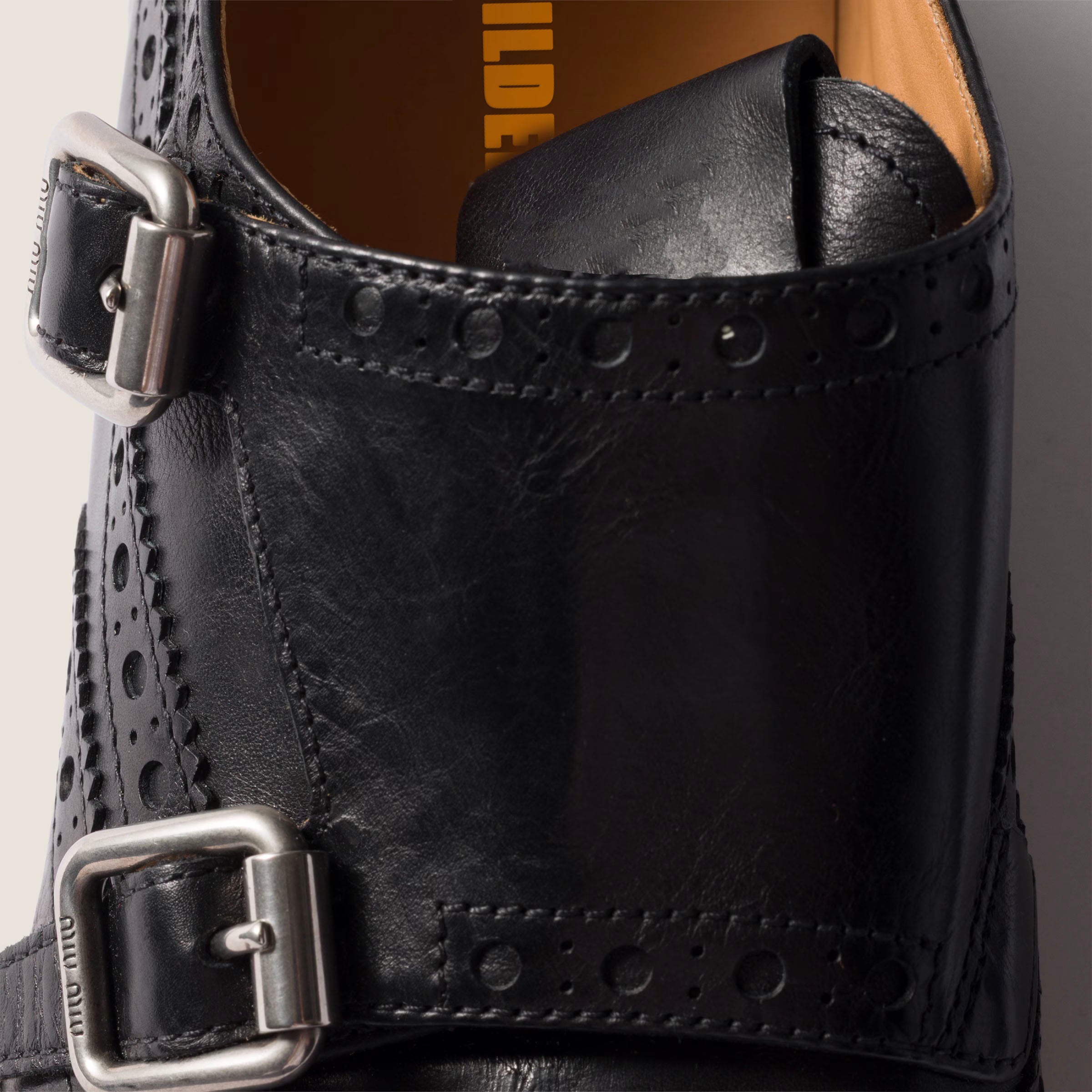 Calf leather brogue shoe with buckles