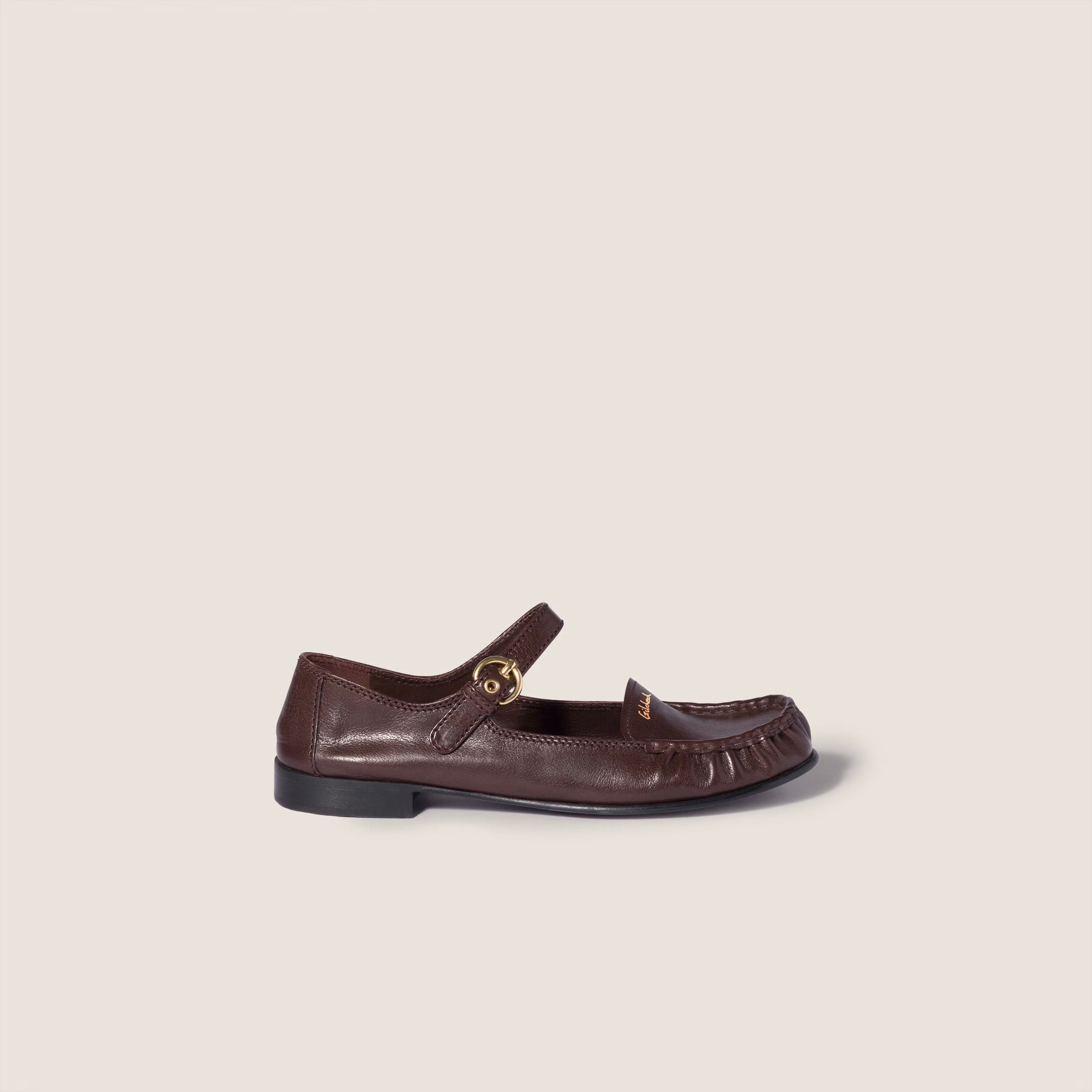 Leather loafers with strap