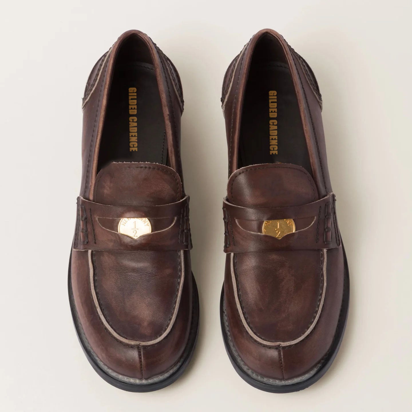 Vintage-effect leather penny loafers