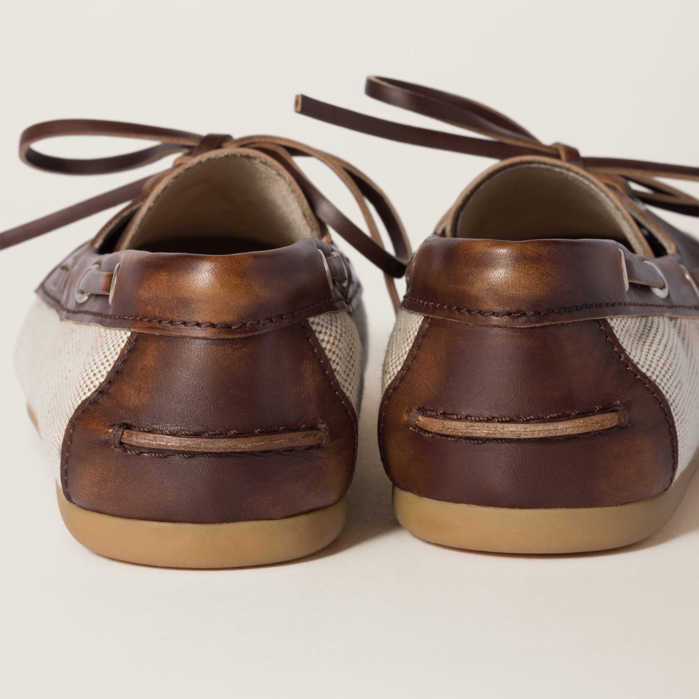 Canvas and bleached leather boat shoes